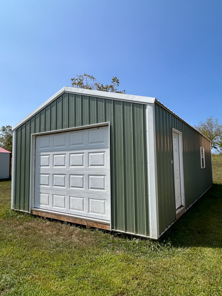 Green metal portable detached garage